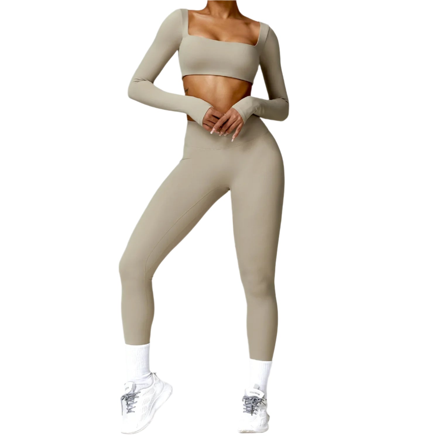 Person wearing a beige athletic outfit on a white background